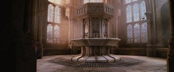 Movie still from “Harry Potter and the Chamber of Secrets” (2002), directed by Chris Columbus – A fountain in the middle of a large room; Extreme Wide shot, High angle