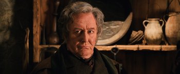 Movie still from “Harry Potter and the Chamber of Secrets” (2002), directed by Chris Columbus – An old man with a beard and a mustache; Close Up shot, Low angle