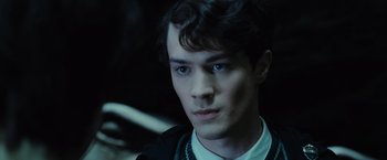 Movie still from “Harry Potter and the Chamber of Secrets” (2002), directed by Chris Columbus – A person wearing a necklace; Close Up shot, High angle