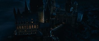 Movie still from “Harry Potter and the Chamber of Secrets” (2002), directed by Chris Columbus – A city lit up at night with lights on; Extreme Wide shot, High angle