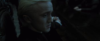 Movie still from “Harry Potter and the Deathly Hallows: Part 1” (2010), directed by David Yates – A person with blonde hair; Close Up shot, Low angle