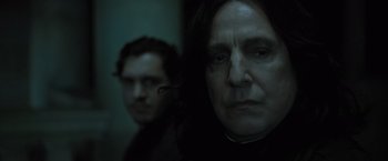 Movie still from “Harry Potter and the Deathly Hallows: Part 1” (2010), directed by David Yates – A man and a woman in a dark room; Close Up shot, Over the shoulder angle