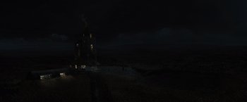 Movie still from “Harry Potter and the Deathly Hallows: Part 1” (2010), directed by David Yates – A dark night with a building in the middle of the night; Extreme Wide shot, Low angle