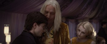 Movie still from “Harry Potter and the Deathly Hallows: Part 1” (2010), directed by David Yates – A man with a long white hair and a man with a long white hair; Close Up shot, Over the shoulder angle