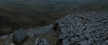 Movie still from “Harry Potter and the Deathly Hallows: Part 1” (2010), directed by David Yates – A view of a mountain from a high point of view; Extreme Wide shot, High angle