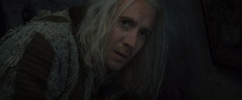 Movie still from “Harry Potter and the Deathly Hallows: Part 1” (2010), directed by David Yates – A person with long white hair; Close Up shot, High angle