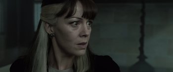 Movie still from “Harry Potter and the Deathly Hallows: Part 2” (2011), directed by David Yates – A person looking at the camera; Close Up shot, Over the shoulder angle