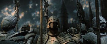 Movie still from “Harry Potter and the Deathly Hallows: Part 2” (2011), directed by David Yates – A knight's armor and a sword; Medium shot, High angle