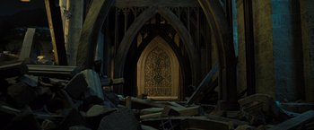 Movie still from “Harry Potter and the Deathly Hallows: Part 2” (2011), directed by David Yates – An old church is being demolished to make way for a new building; Wide shot, Low angle