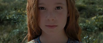 Movie still from “Harry Potter and the Deathly Hallows: Part 2” (2011), directed by David Yates – A young girl's face; Close Up shot, High angle