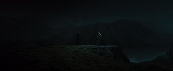 Movie still from “Harry Potter and the Deathly Hallows: Part 2” (2011), directed by David Yates – Two people standing on top of a hill at night; Extreme Wide shot, Low angle