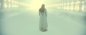 Movie still from “Harry Potter and the Deathly Hallows: Part 2” (2011), directed by David Yates – A woman standing in the middle of a snowy field; Wide shot, Low angle