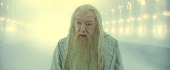 Movie still from “Harry Potter and the Deathly Hallows: Part 2” (2011), directed by David Yates – An old man with long white hair and a beard; Close Up shot, Low angle