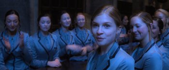 Movie still from “Harry Potter and the Goblet of Fire” (2005), directed by Mike Newell – A group of young women sitting next to each other; Close Up shot, Low angle