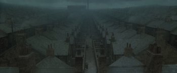 Movie still from “Harry Potter and the Half-Blood Prince” (2009), directed by David Yates – An image of a dark city with a lot of buildings; Extreme Wide shot, High angle