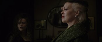 Movie still from “Harry Potter and the Half-Blood Prince” (2009), directed by David Yates – A person looking at a mirror; Close Up shot, Low angle