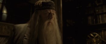 Movie still from “Harry Potter and the Half-Blood Prince” (2009), directed by David Yates – A person with a beard; Close Up shot, Over the shoulder angle