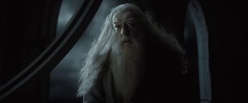 Movie still from “Harry Potter and the Half-Blood Prince” (2009), directed by David Yates – An old man with long white hair and a white beard; Close Up shot, Low angle