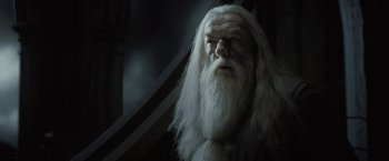Movie still from “Harry Potter and the Half-Blood Prince” (2009), directed by David Yates – An old man with long white hair and a beard; Close Up shot, Low angle