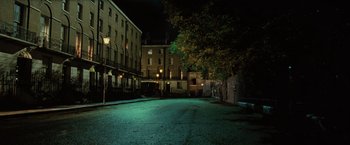 Movie still from “Harry Potter and the Order of the Phoenix” (2007), directed by David Yates – A street at night lit up by streetlights; Extreme Wide shot, High angle