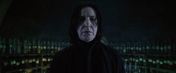 Movie still from “Harry Potter and the Order of the Phoenix” (2007), directed by David Yates – A person wearing a snape mask; Close Up shot, Low angle