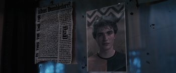 Movie still from “Harry Potter and the Order of the Phoenix” (2007), directed by David Yates – A picture of a young man hanging on a wall; Close Up shot, High angle