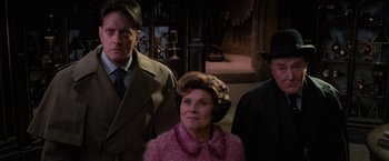 Movie still from “Harry Potter and the Order of the Phoenix” (2007), directed by David Yates – A group of people standing next to each other in a room; Medium shot, Low angle