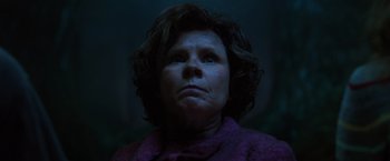 Movie still from “Harry Potter and the Order of the Phoenix” (2007), directed by David Yates – A person looking at the camera; Close Up shot, Low angle