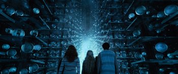 Movie still from “Harry Potter and the Order of the Phoenix” (2007), directed by David Yates – A group of people standing next to each other in a room; Wide shot, Low angle