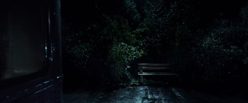 Movie still from “Harry Potter and the Prisoner of Azkaban” (2004), directed by Alfonso Cuarón – A wooden bench sitting in the middle of a forest; Extreme Wide shot, High angle