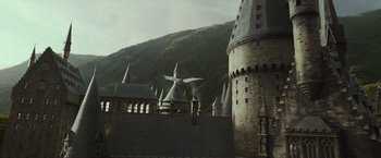 Movie still from “Harry Potter and the Prisoner of Azkaban” (2004), directed by Alfonso Cuarón – An image of a castle with a bird flying over it; Extreme Wide shot, High angle