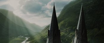 Movie still from “Harry Potter and the Prisoner of Azkaban” (2004), directed by Alfonso Cuarón – A church steeple in the middle of a valley; Extreme Wide shot, Low angle