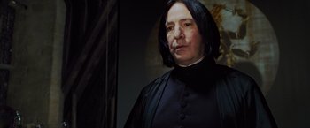 Movie still from “Harry Potter and the Prisoner of Azkaban” (2004), directed by Alfonso Cuarón – A person with long black hair; Close Up shot, Low angle