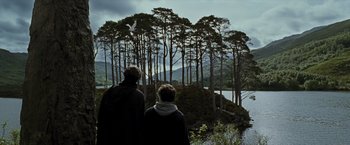 Movie still from “Harry Potter and the Prisoner of Azkaban” (2004), directed by Alfonso Cuarón – Two people looking out over a body of water; Extreme Wide shot, Low angle