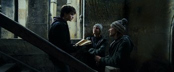 Movie still from “Harry Potter and the Prisoner of Azkaban” (2004), directed by Alfonso Cuarón – A group of young men standing next to each other; Medium shot, High angle