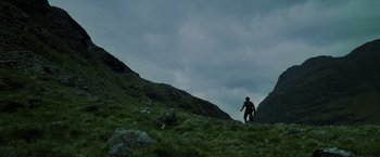 Movie still from “Harry Potter and the Prisoner of Azkaban” (2004), directed by Alfonso Cuarón – A man that is walking up a hill; Extreme Wide shot, Low angle