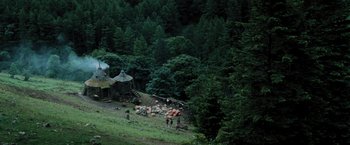 Movie still from “Harry Potter and the Prisoner of Azkaban” (2004), directed by Alfonso Cuarón – A group of people standing on top of a grass covered hillside; Extreme Wide shot, High angle