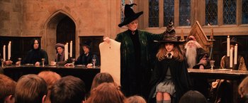 Movie still from “Harry Potter and the Sorcerer's Stone” (2001), directed by Chris Columbus – A woman and a girl dressed as harry potter; Medium shot, High angle