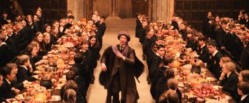 Movie still from “Harry Potter and the Sorcerer's Stone” (2001), directed by Chris Columbus – A group of people dressed up as harry potter; Wide shot, High angle