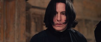 Movie still from “Harry Potter and the Sorcerer's Stone” (2001), directed by Chris Columbus – Severus snape is looking at the camera; Close Up shot, Low angle