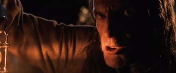 Movie still from “Harry Potter and the Sorcerer's Stone” (2001), directed by Chris Columbus – A man with long hair; Extreme Close Up shot, Low angle