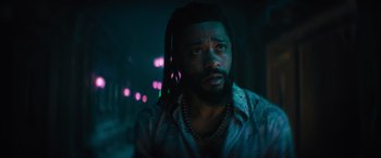 Movie still from “Haunted Mansion” (2023), directed by Justin Simien – A person with a dreadlock; Close Up shot, Low angle