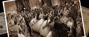 Movie still from “Haunted Mansion” (2023), directed by Justin Simien – A group of people sitting in a room; Wide shot, High angle