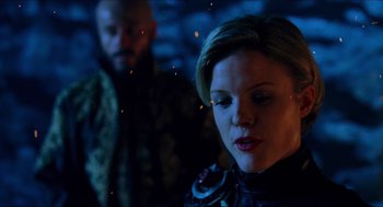 Movie still from “Hellboy” (2004), directed by Guillermo del Toro – A man and a woman are standing in the dark; Close Up shot, Over the shoulder angle