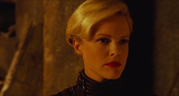 Movie still from “Hellboy” (2004), directed by Guillermo del Toro – A person with blonde hair; Close Up shot, Low angle