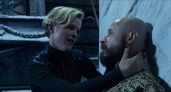 Movie still from “Hellboy” (2004), directed by Guillermo del Toro – A man and a woman are looking at each other; Close Up shot, Over the shoulder angle