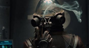 Movie still from “Hellboy II: The Golden Army” (2008), directed by Guillermo del Toro – An image of a gun that is in a room; Close Up shot, Low angle