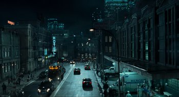 Movie still from “Hellboy II: The Golden Army” (2008), directed by Guillermo del Toro – A city street at night filled with lots of traffic; Extreme Wide shot, High angle
