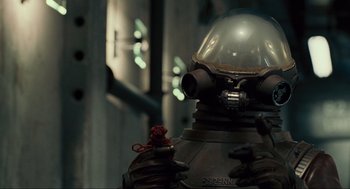 Movie still from “Hellboy II: The Golden Army” (2008), directed by Guillermo del Toro – The helmet of a space suit; Close Up shot, Low angle