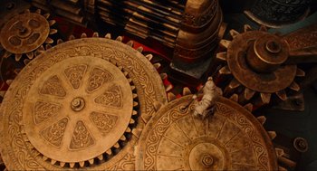 Movie still from “Hellboy II: The Golden Army” (2008), directed by Guillermo del Toro – View of a large wooden gear; Extreme Wide shot, Overhead angle